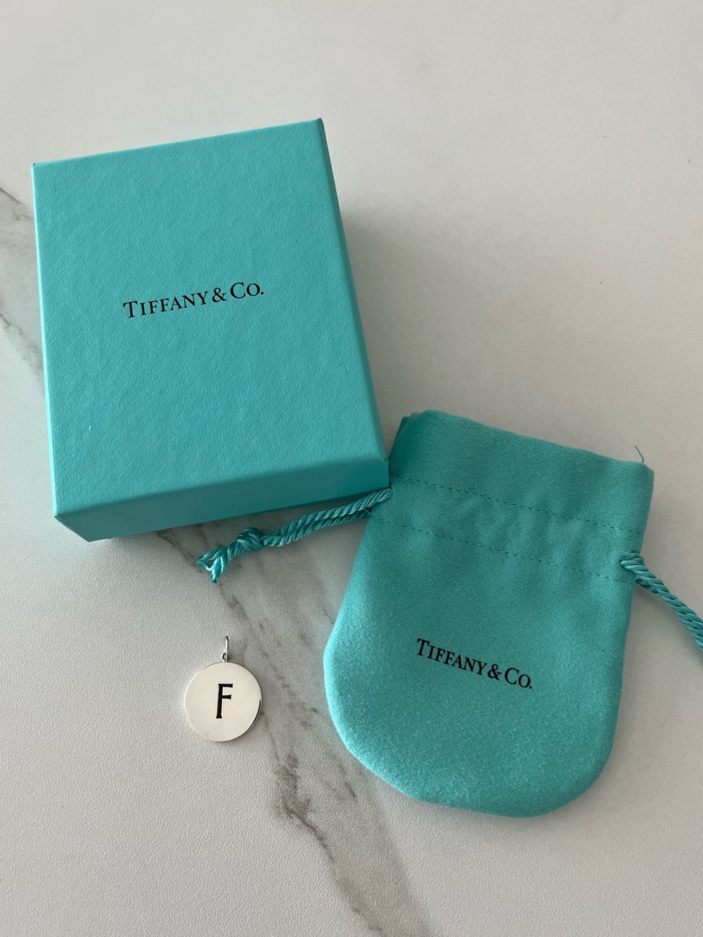 Tiffany & Co. (New - never used!!!) silver initial F pendant